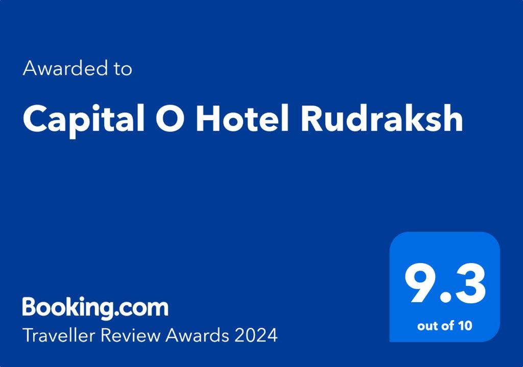 MājraCapital O Hotel Rudraksh的蓝标,写有首都或酒店之词