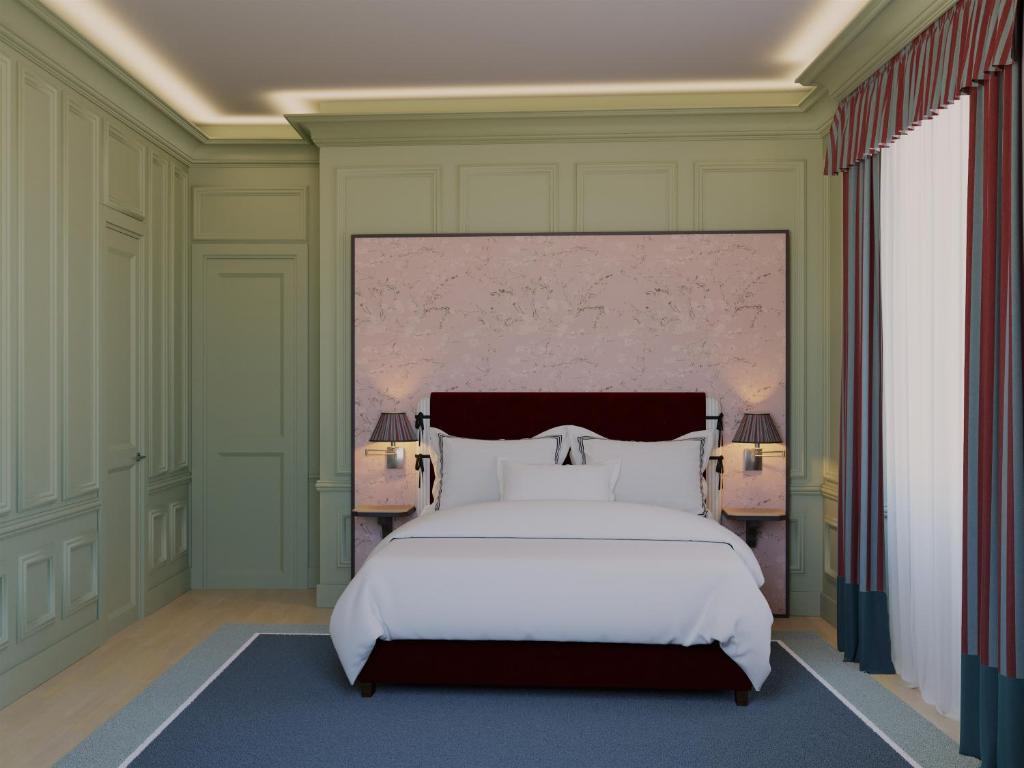 佛罗伦萨伊莎贝拉室友酒店的卧室配有一张白色大床和两盏灯。