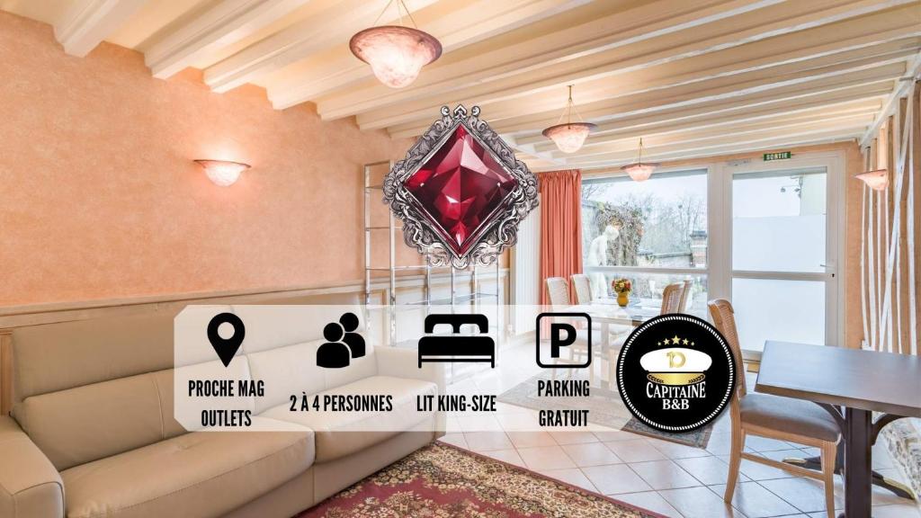 圣玛丽桥Le RUBIS - Confort - Proche Mag Outlet Troyes - Parking gratuit的带沙发和红色钻石的客厅