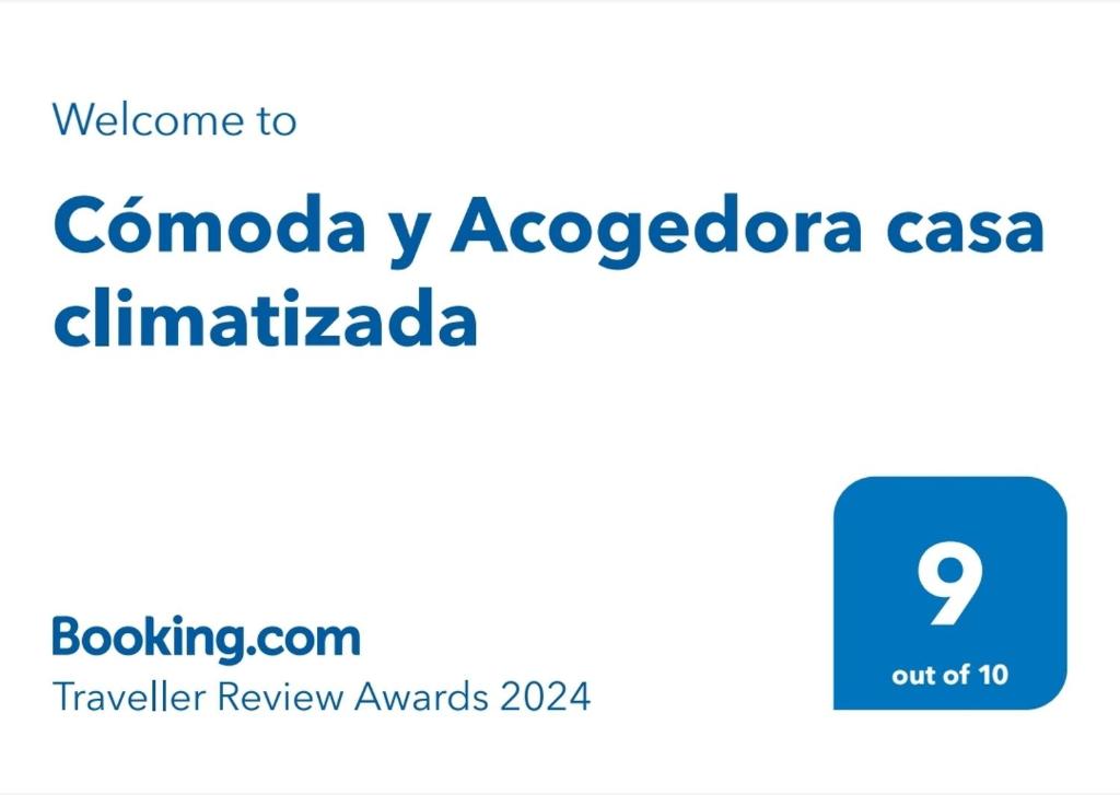 蓬塔阿雷纳斯Cómoda y Acogedora casa climatizada的带有漫画的手机的屏幕