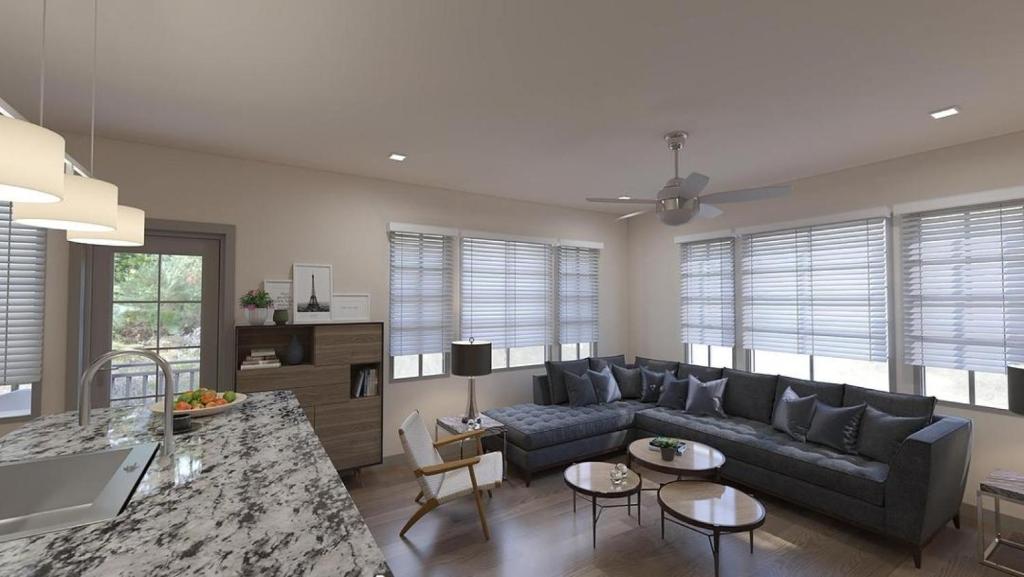 MiddleburgLanding Modern Apartment with Amazing Amenities (ID9574X29)的客厅配有沙发和桌子