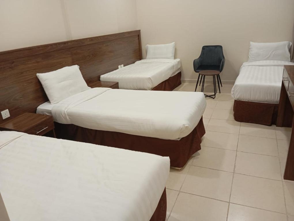 فندق الساعي Alsai Hotel客房内的一张或多张床位