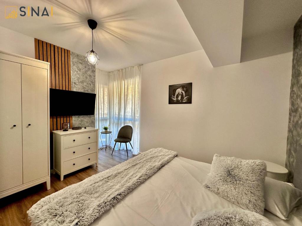 SINAI APH Apartments客房内的一张或多张床位