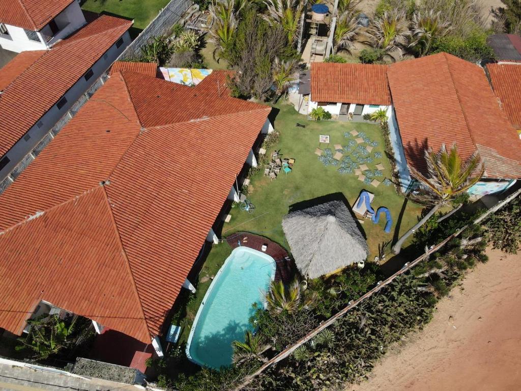 São Gonçalo do Amarantecasa na Taiba - de frente ao mar - piscina - lagoa do kite的享有带游泳池的房屋的空中景致