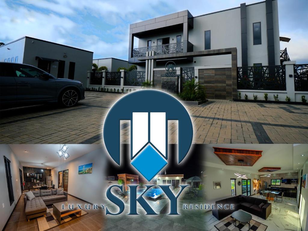 帕拉马里博Luxury Sky Residence Double Bedroom的前面有缩写的天空的房子