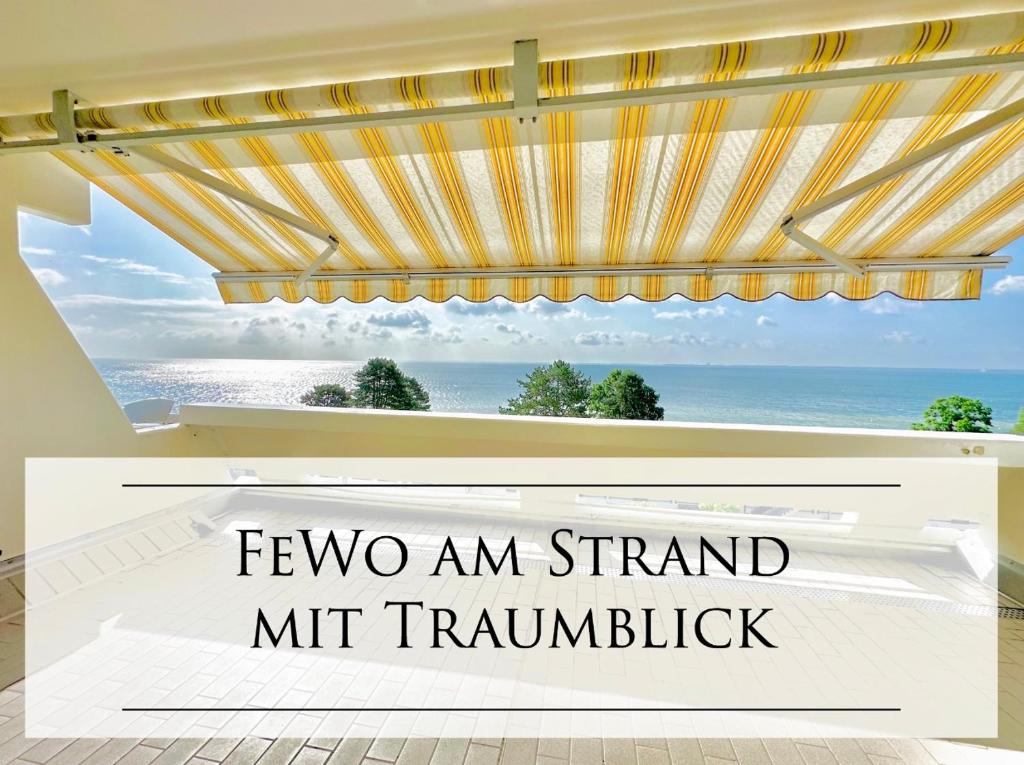 希尔克道夫Familienparadies mit TRAUM Meerblick am Strand mit großem Balkon - WLAN, Streaming, 2024 modernisiert的两个发烧的迹象,一个站的转弯