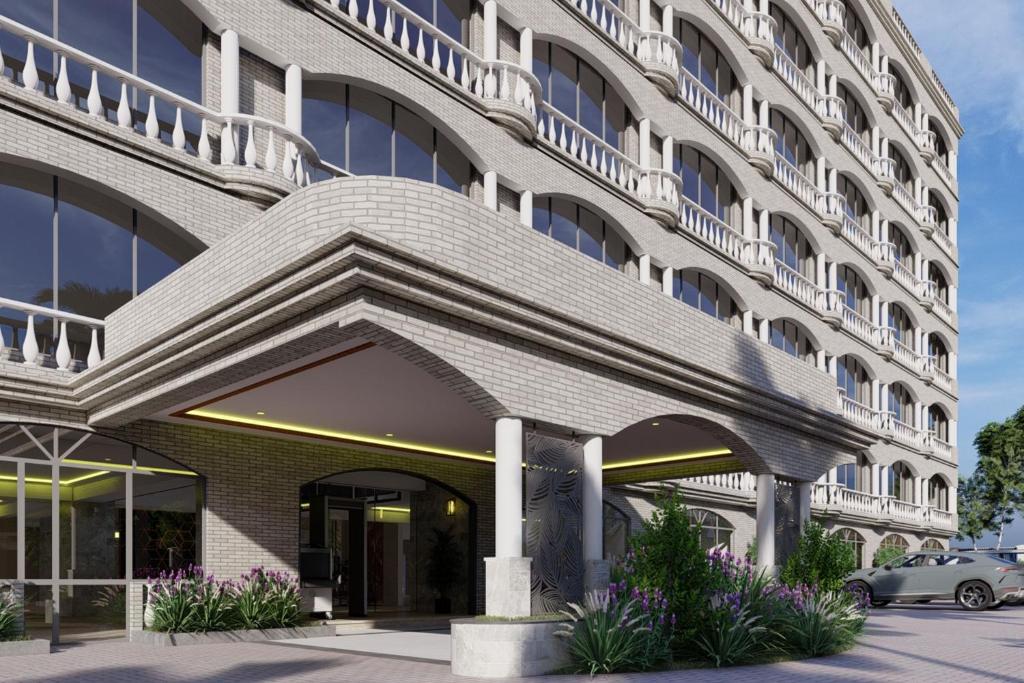 达累斯萨拉姆Delta Hotels by Marriott Dar es Salaam的大楼的外部景观