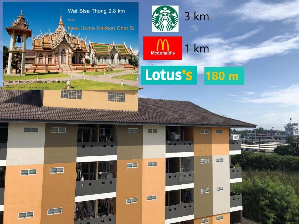 那空猜西New Home Nakhon Chai Si的享有酒店大楼的景色