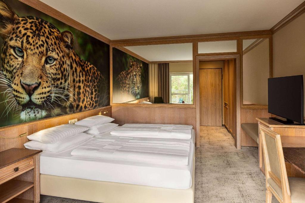 Amedia Hotel &amp; Suites Leipzig, Trademark Collection by Wyndham客房内的一张或多张床位