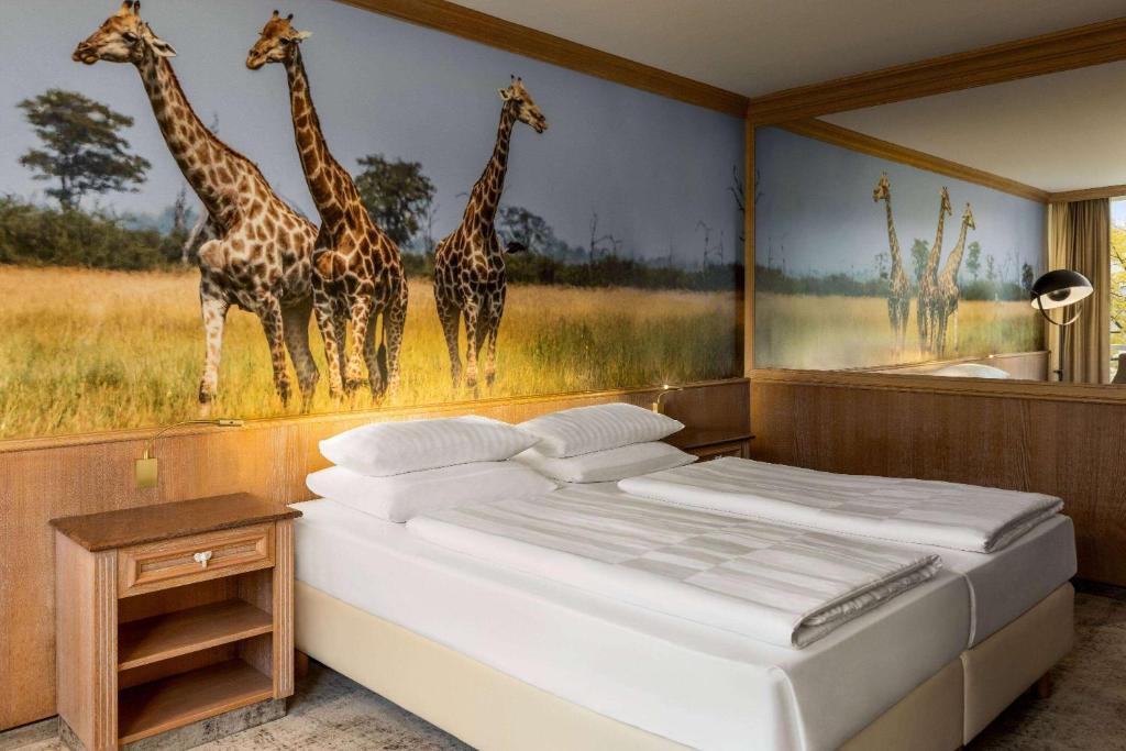 Amedia Hotel &amp; Suites Leipzig, Trademark Collection by Wyndham客房内的一张或多张床位