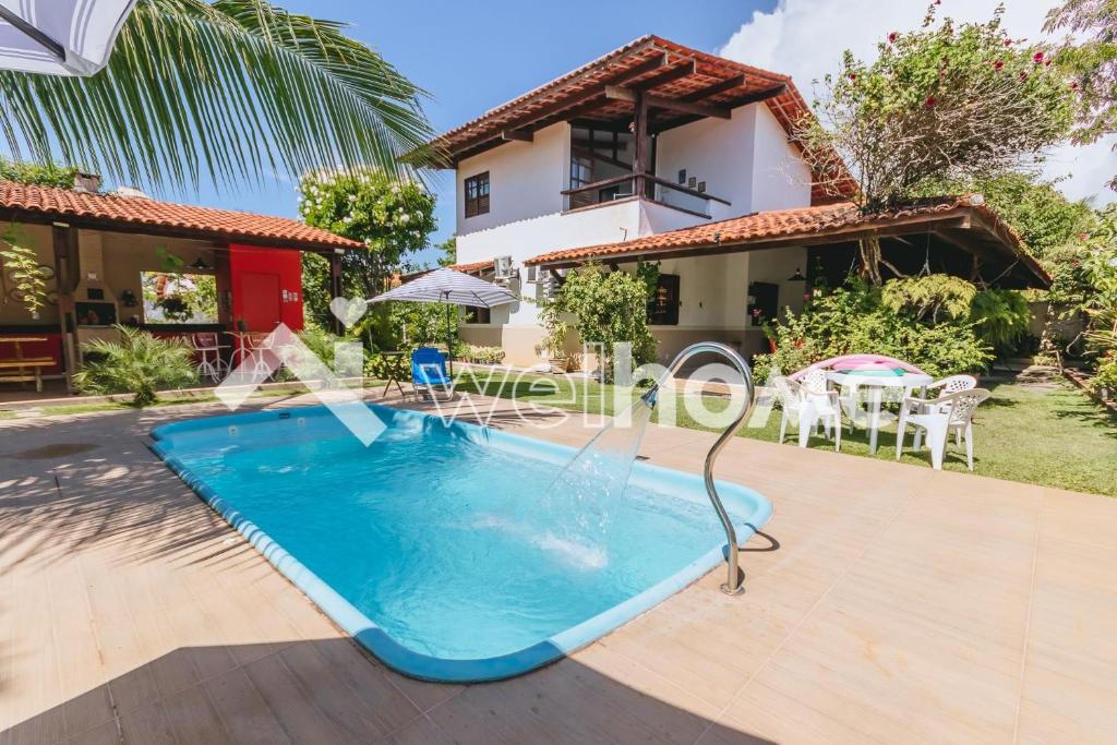 拉巴拉德纳圣安东尼奥Casa com piscina a 5 min da praia em Alagoas的房屋前的游泳池