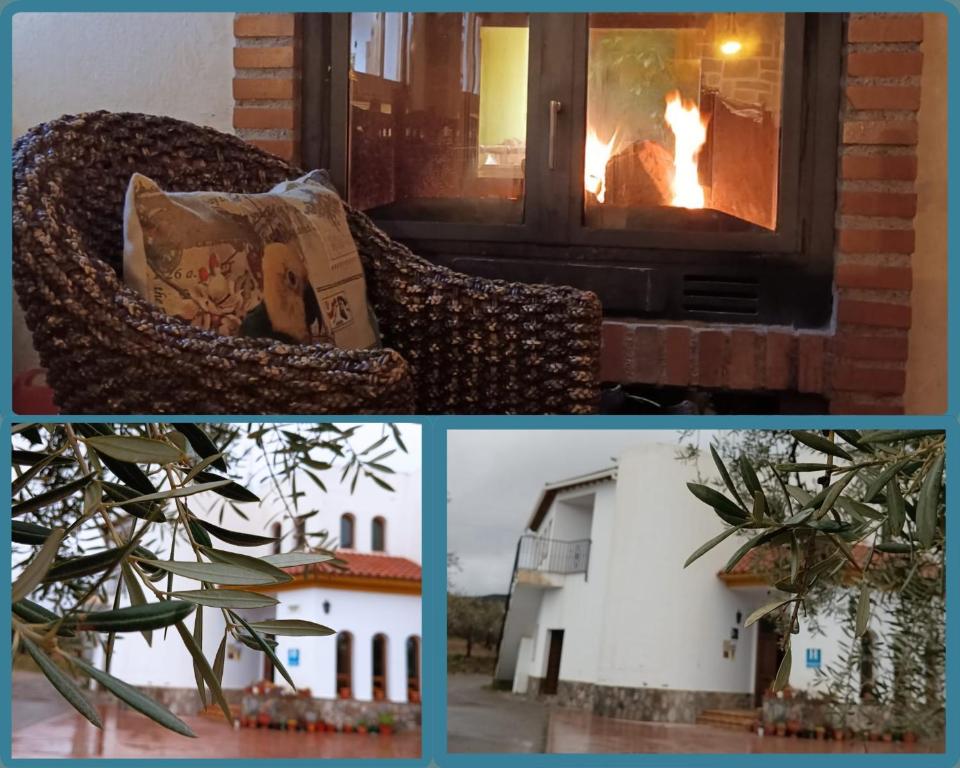 劳哈尔德亚恩达拉斯阿米雷-阿普哈拉家庭乡村酒店的窗户上的火炉,配有沙发和壁炉