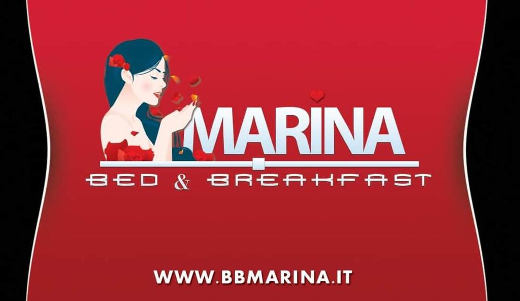 莱切省卡斯特罗B&B Marina的码头住宿加早餐旅馆的红色标志
