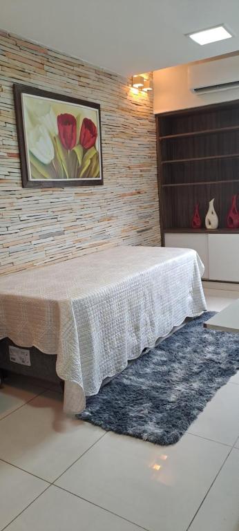 巴西利亚Grand Ville Asa sul的一间卧室配有一张壁画床