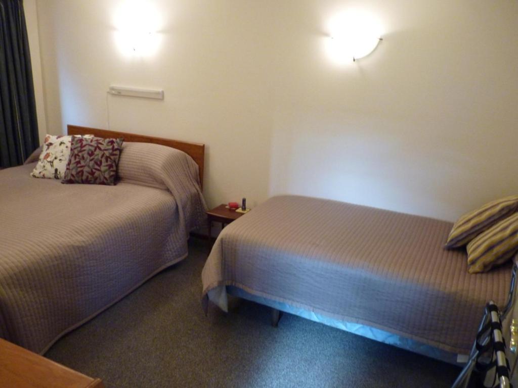 哈夫洛克丽吉塔民宿的一间酒店客房内设有两张床的房间