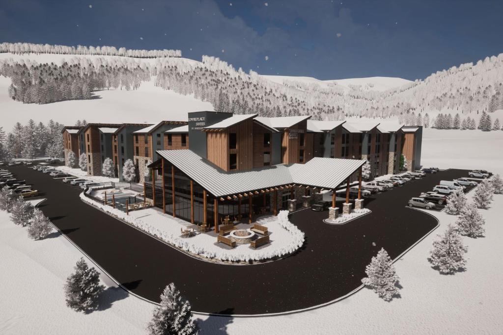 埃文TownePlace Suites by Marriott Avon Vail Valley的雪中 ⁇ 染度假胜地