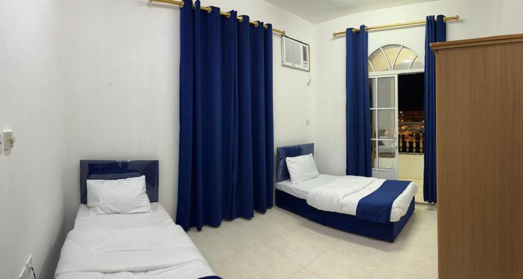 Al Manafa Furnished Apartments客房内的一张或多张床位