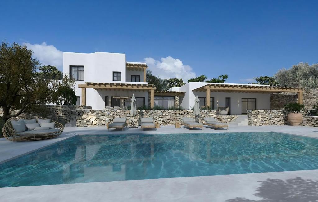 萨鲁Amazing Villa 6bed in Agios Lazaros Mykonos的别墅前设有游泳池
