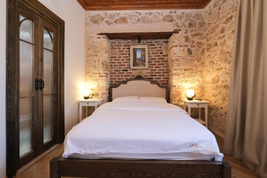 Saye Konak Hotel &#39; Kaleiçi&amp;Oldtown&#39;客房内的一张或多张床位