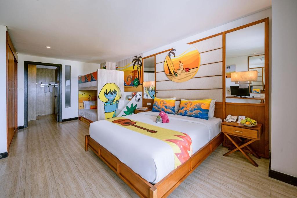 坎古Lv8度假酒店的一间卧室,卧室内配有一张大床