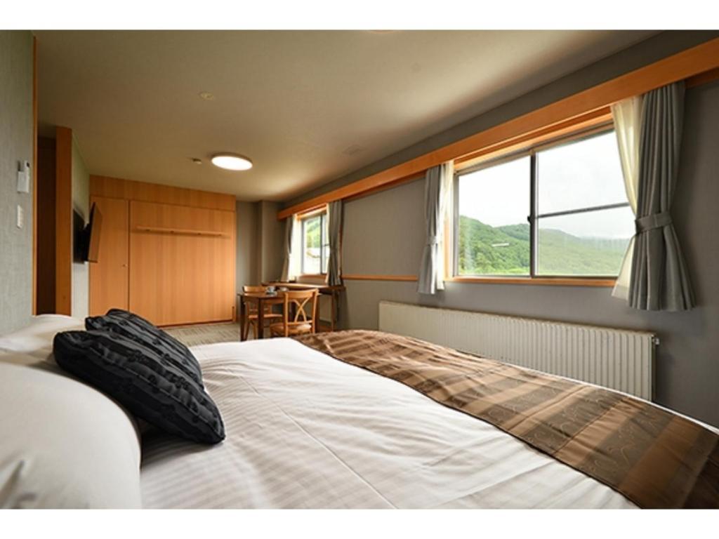 Hotel Takimoto - Vacation STAY 43491v客房内的一张或多张床位