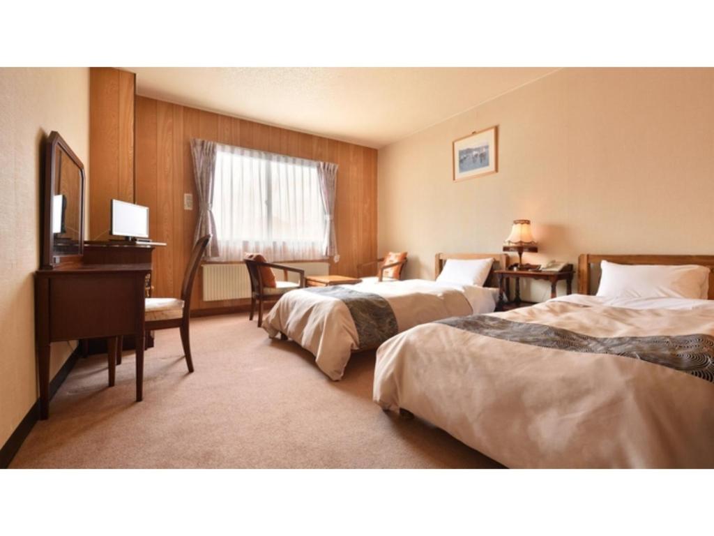 Hotel Takimoto - Vacation STAY 43486v客房内的一张或多张床位