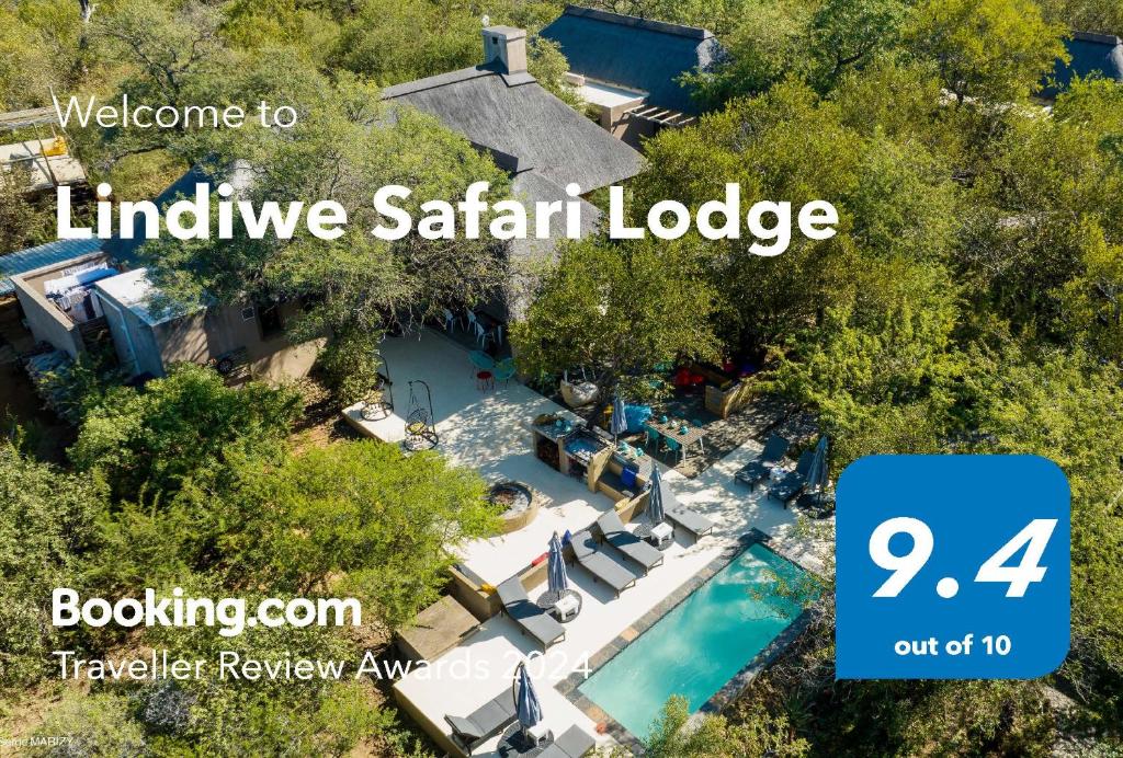 侯斯普瑞特Lindiwe Safari Lodge的享有游泳池和度假村的空中景致