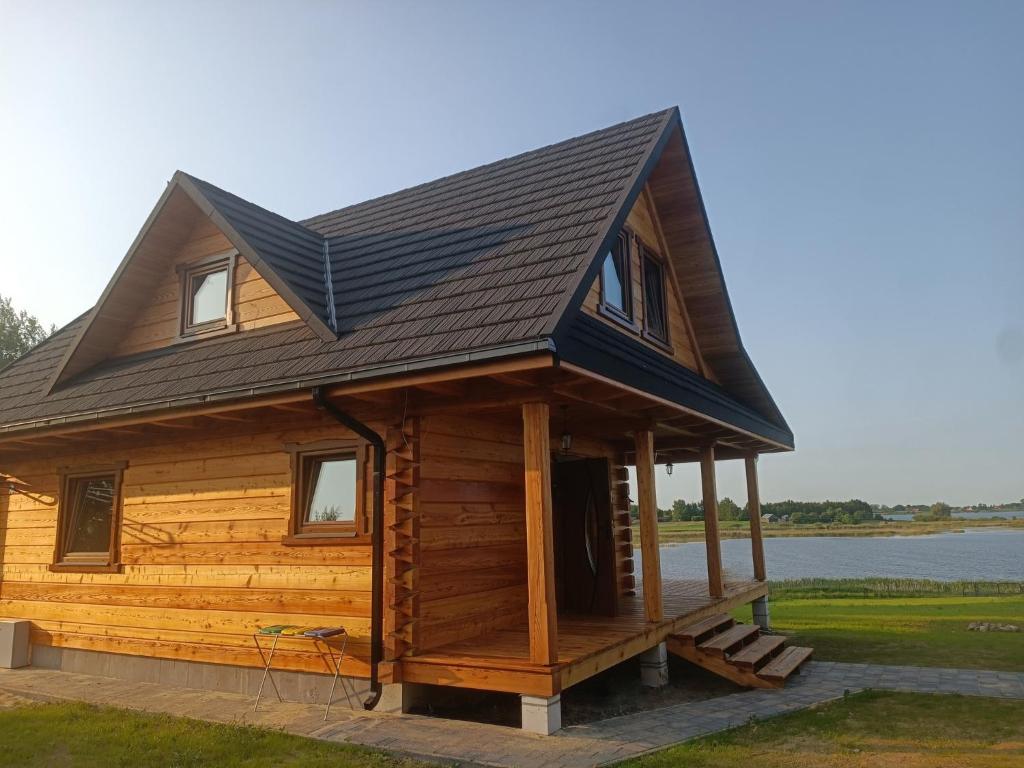 SułówU Szwagra, domek całoroczny的小木屋,设有 ⁇ 篷