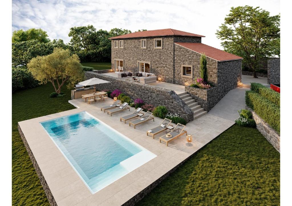 Antas de UllaReverence Villas Caldelas的享有带游泳池的房屋的空中景致