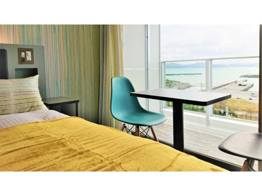 Green Rich Hotel Okinawa Nago - Vacation STAY 55417v的休息区