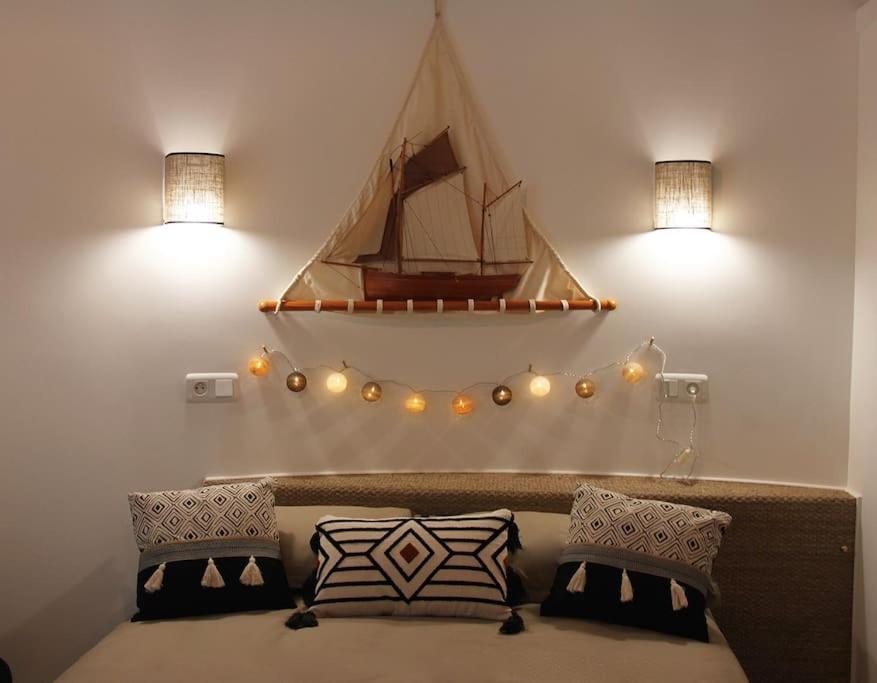 LA CASETA, Gîte 4 étoiles entre mer et lac marin客房内的一张或多张床位