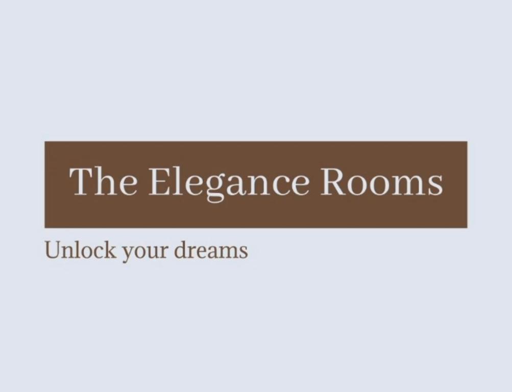 尼兹瓦The Elegance Rooms的读一则优雅客房的标志,开启了你的梦想