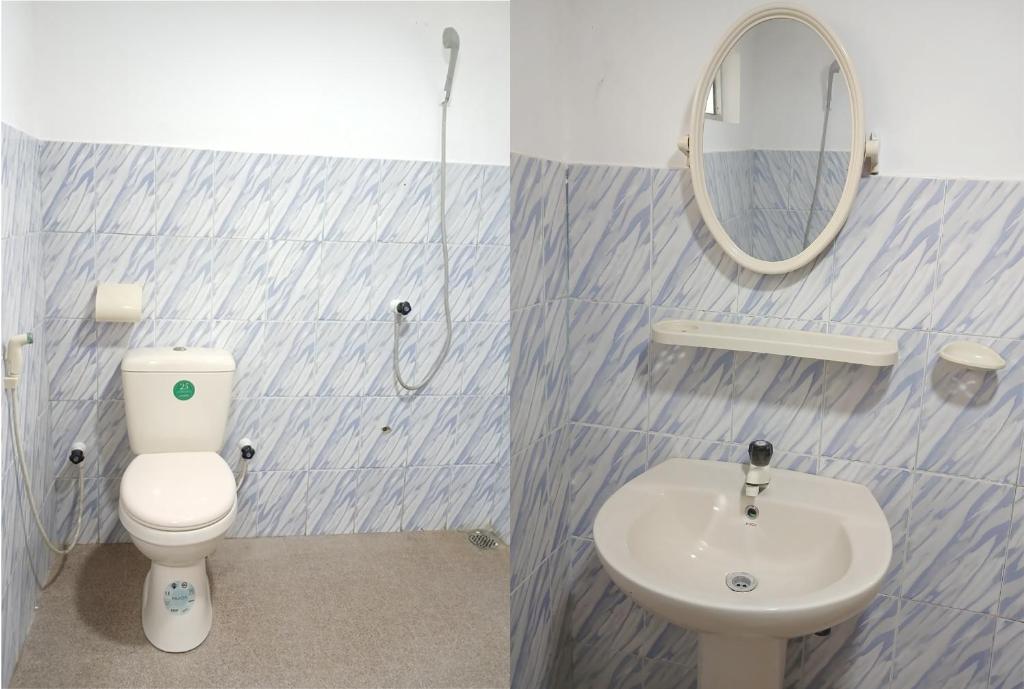 UreluWhiterock Villa的一间带卫生间、水槽和镜子的浴室