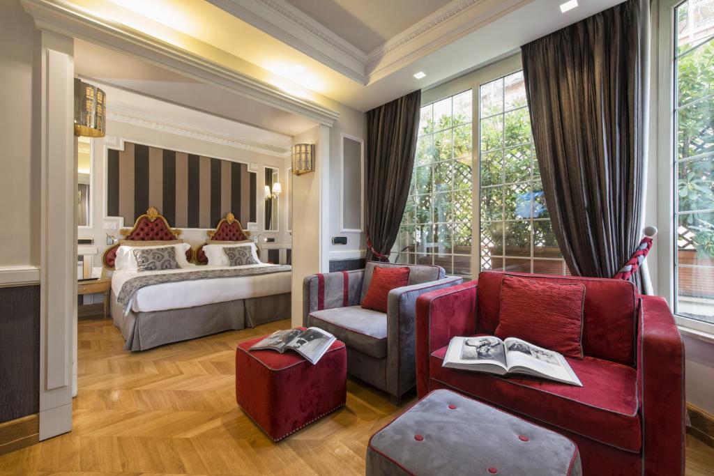罗马大不列颠酒店的酒店客房 - 带一间卧室和一张床