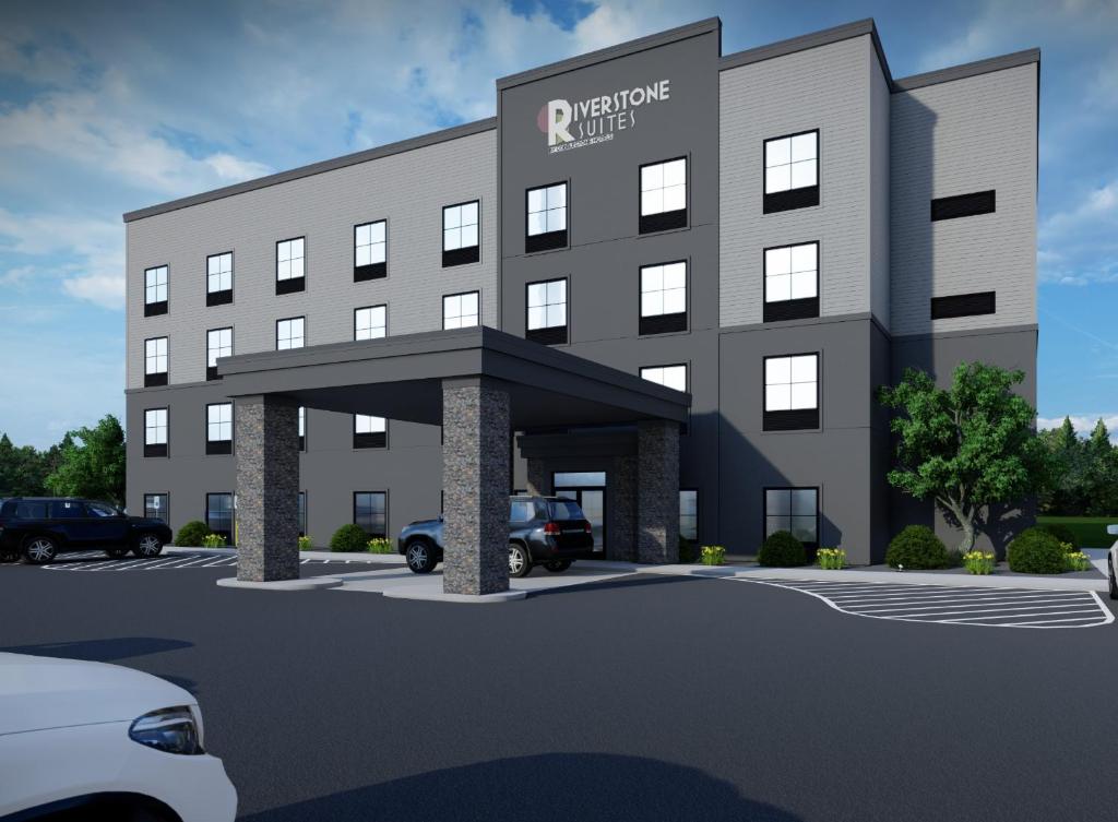 奇珀瓦福尔斯Riverstone Suites by Cobblestone Hotels - Chippewa Falls的 ⁇ 染新办公楼