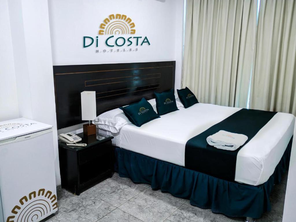 Di Costa Hoteles客房内的一张或多张床位