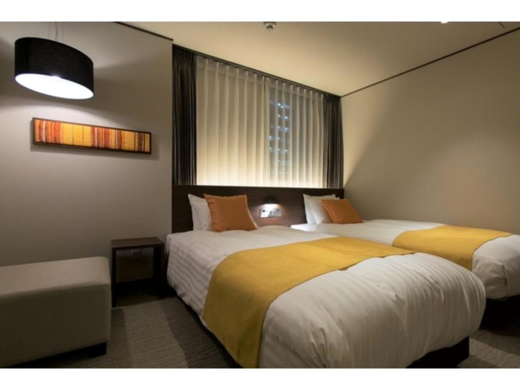 KITA HOTEL - Vacation STAY 69755v客房内的一张或多张床位