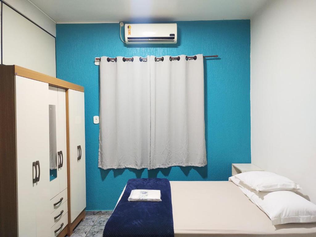 Apartamento aconchegante em Cacoal4客房内的一张或多张床位