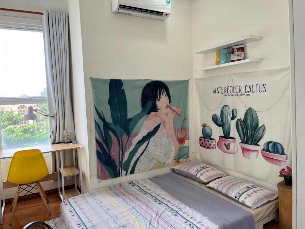 胡志明市Veganhome的一间卧室配有一张壁画床