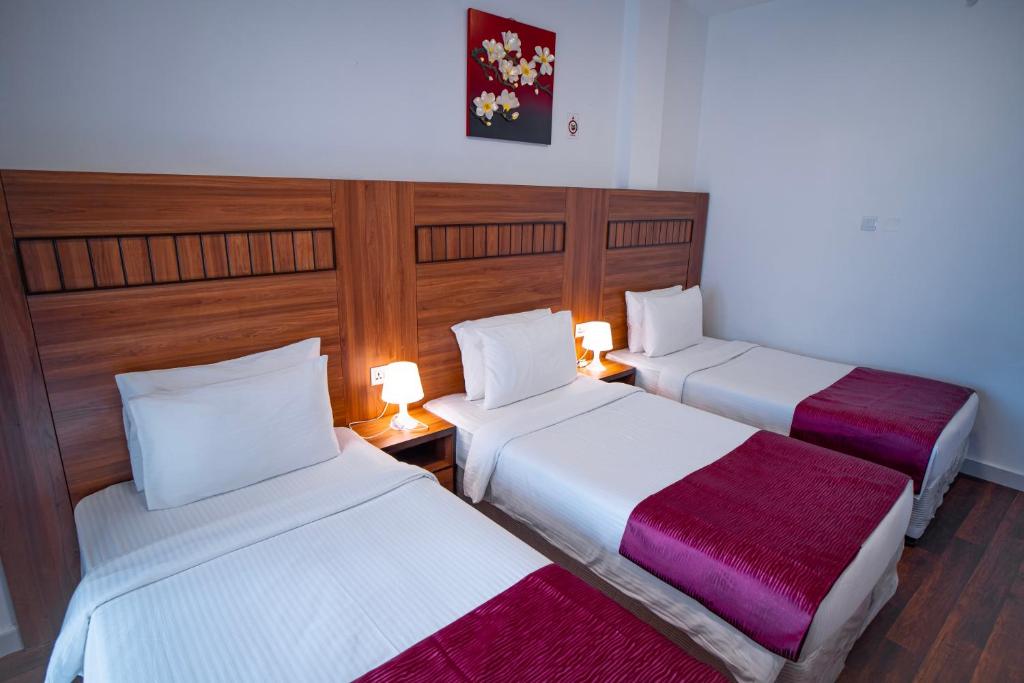 AL KARNAK HOTEL - BRANCH客房内的一张或多张床位