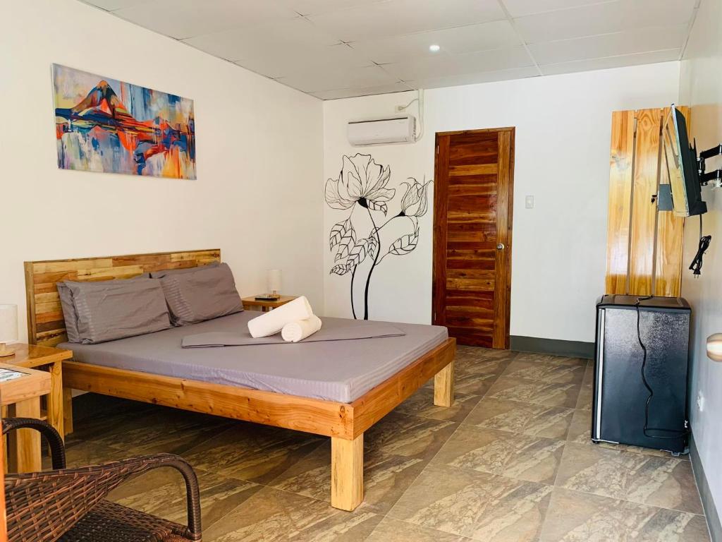 邦劳Buona Vita resort的卧室配有一张床