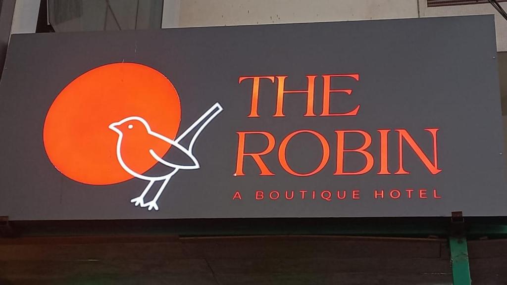 斋浦尔The Robin- A Boutique Hotel的罗宾精品酒店的标志