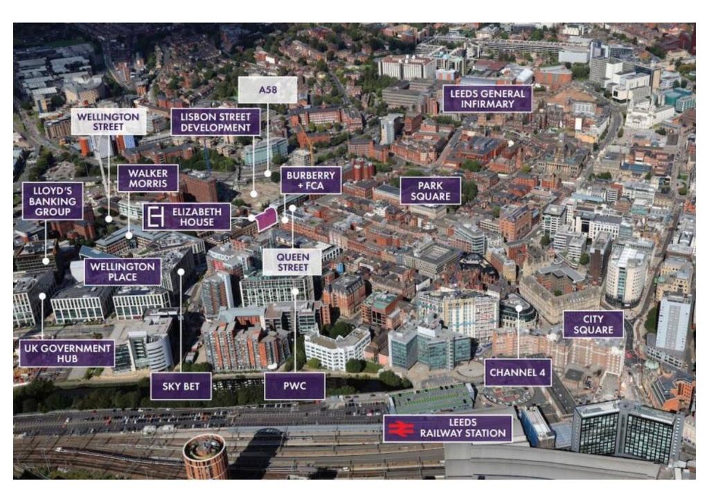 利兹Ideal for Professional Staff in LS1 Financial Hub的紫色标志城市的上方景色