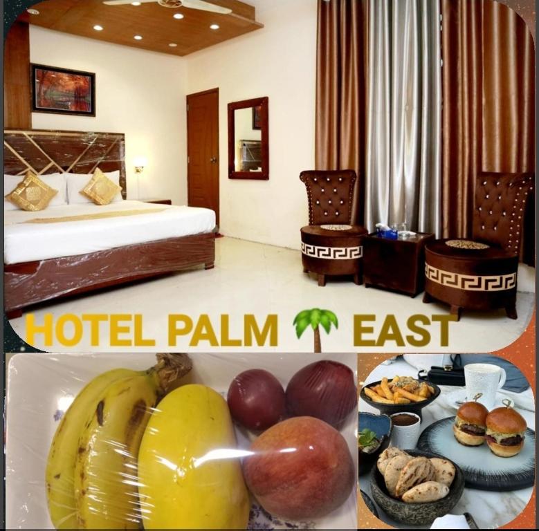 拉合尔Hotel palm east lahore的一间酒店房间,桌上放着一大堆水果