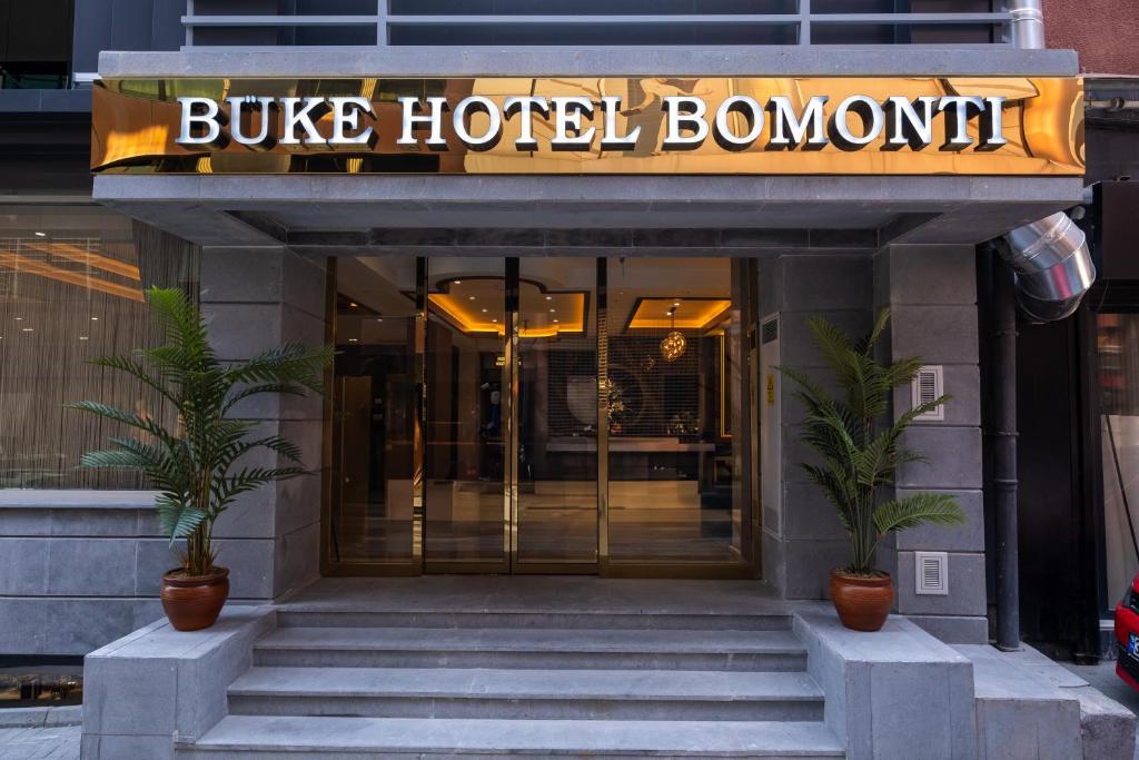 伊斯坦布尔Buke Hotel Bomonti的一座建筑,上面标有阅读布尔加斯邦蒙酒店