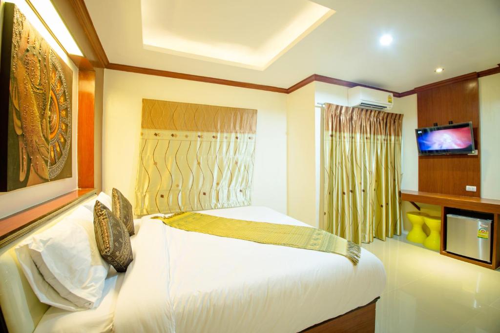 伊尔马尔芭东广场酒店客房内的一张或多张床位