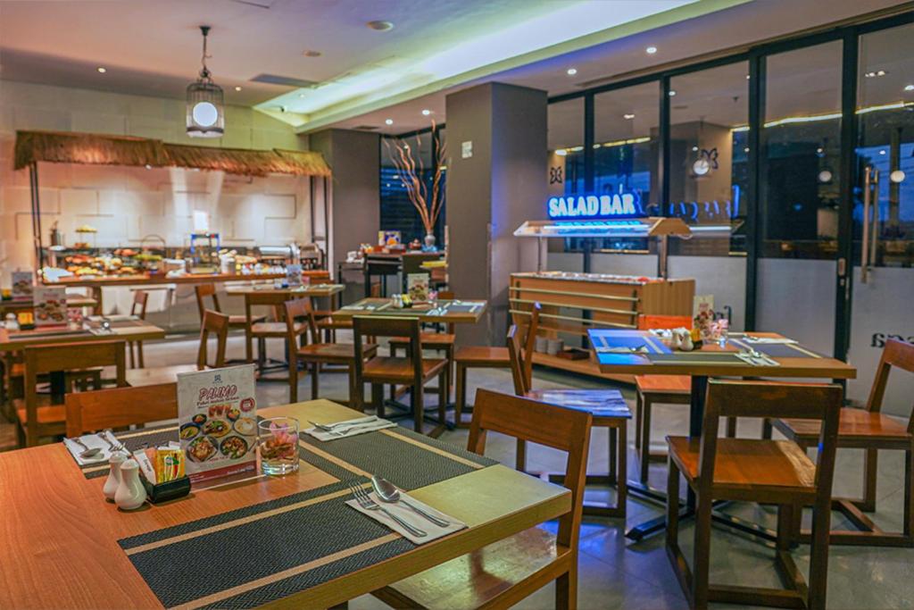 巴提卡巨港酒店餐厅或其他用餐的地方