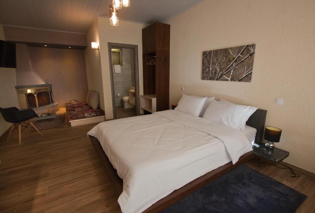 里瓦迪套房旅馆客房内的一张或多张床位