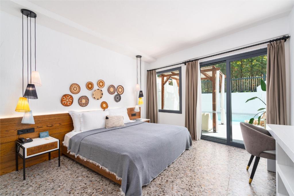 Ölüdeniz Blu Luxury Unique Hotel - Adults-Only客房内的一张或多张床位