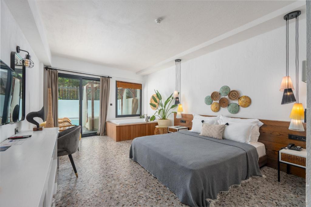 Ölüdeniz Blu Luxury Unique Hotel - Adults-Only客房内的一张或多张床位